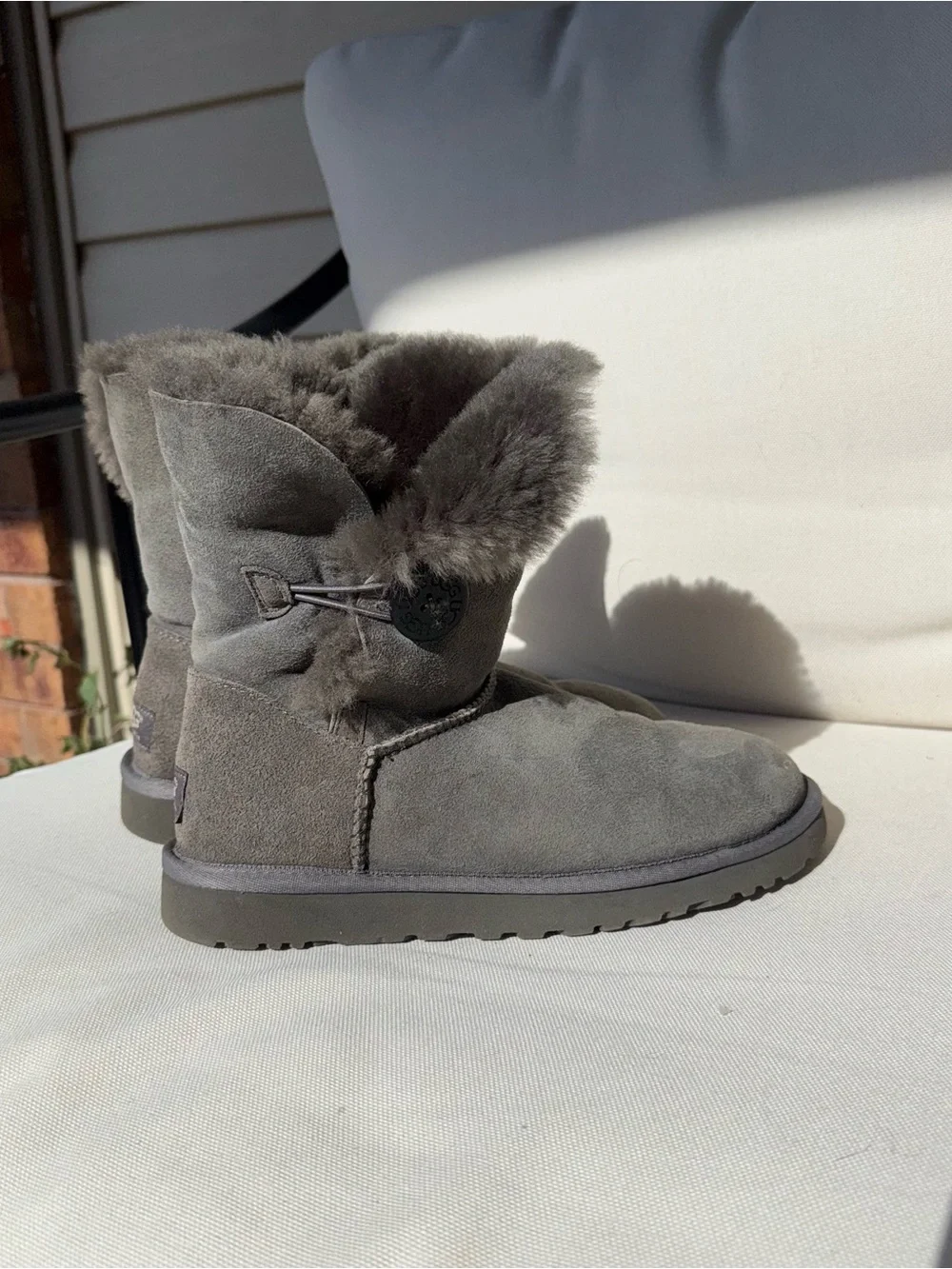Women's Short Sheepskin Bailey Button Ugg Winter Boots in Gray